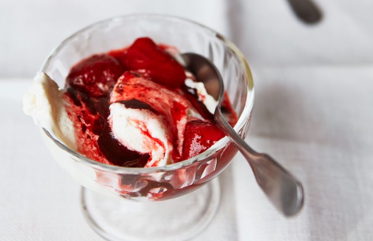 Ixta Belfrage's whipped yoghurt with roasted strawberries and peanut fudge sauce